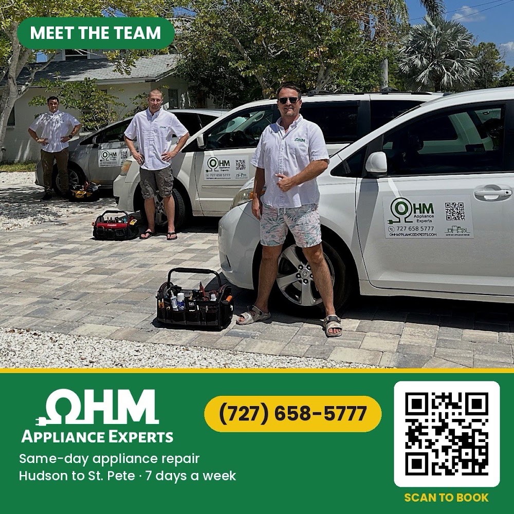 OHM Appliance Experts technician with the service van in Trinity, FL